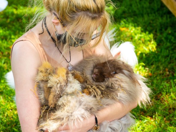 a person holding a bird
