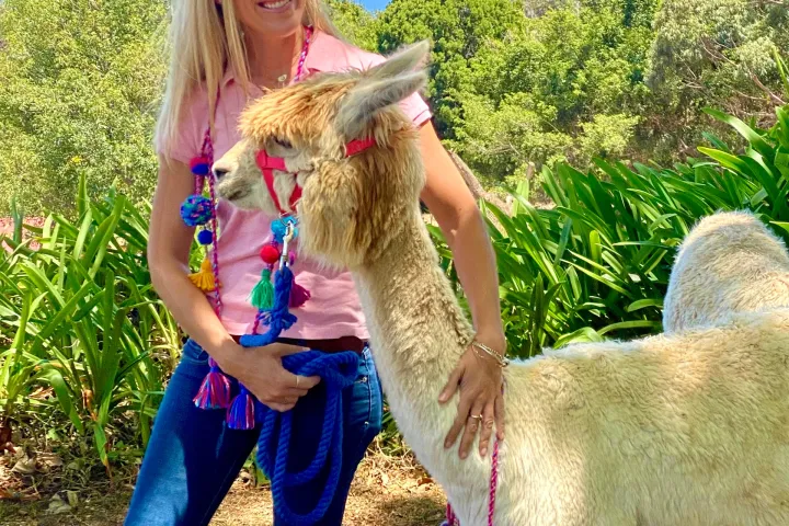 a person holding an animal